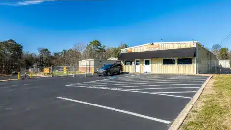 Nicely paved parking lot in front of a Mini Mall Storage facility in Soddy Daisy TN