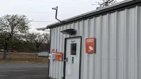 Secure keypad entry to indoor self storage monitored 24/7 by security camera surveillance.