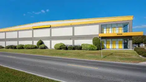Road approach shot of Mini Mall Storage's facility in Metairie on the N I-10 Service road